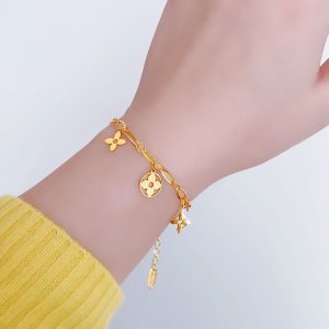 Titanium steel gold hollow four-leaf clover tassel bracelet for women